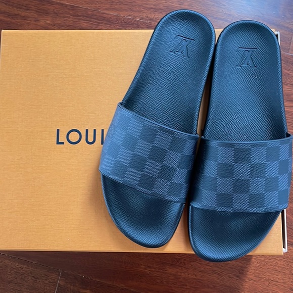 Louis Vuitton Other - Louis Vuitton slide sandals. Brand new never been worn. Sizing runs big.